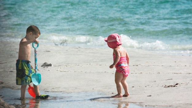 day at the beach child's play siblings #1